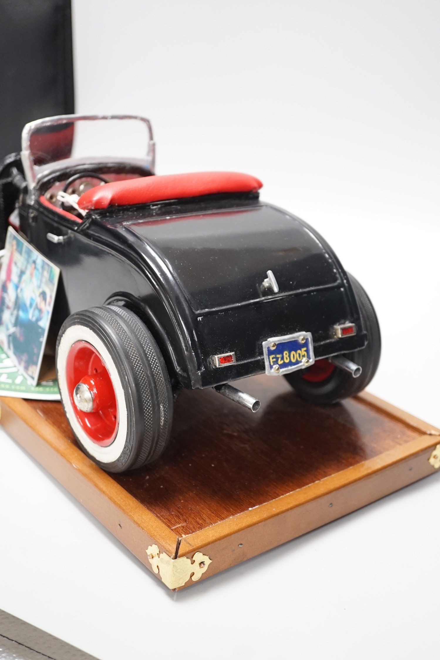A scratch built model of Elvis Presley's Ford Coupe. 49cm wide